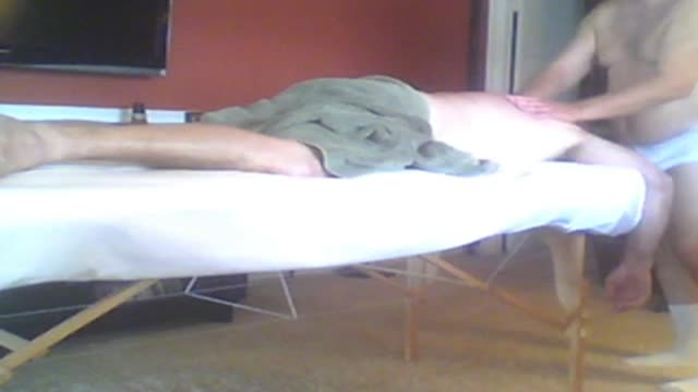 Business-man-have-a-massage-by sexy bear