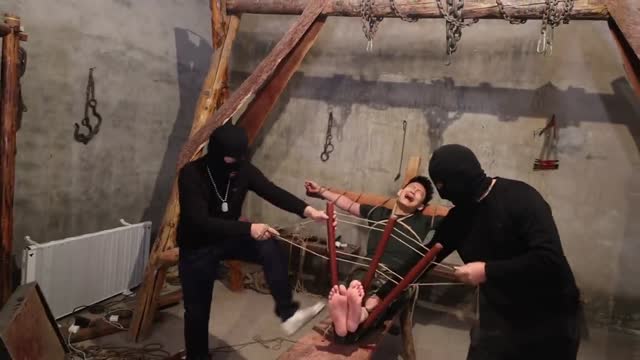 Torture a Chinese guy