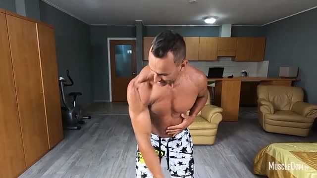 Musuclar man flexing 