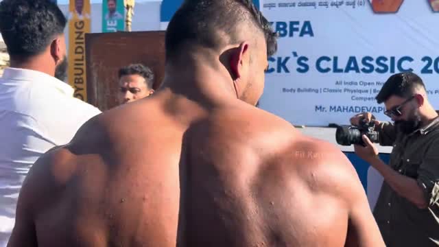 Backstage bodybuilders  (no nudity)