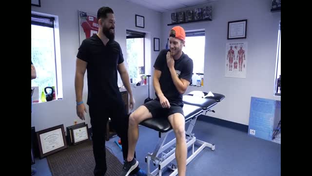 Shane tickled by chiropractor