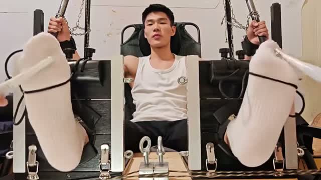Chinese guy's feet tickled