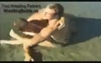 bodybuilder beach wrestling