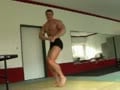 Muscled Man Posing in Black Briefs