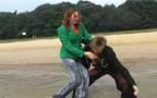 Guy gets wet in the Lake with his gf