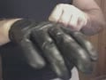 leather gloves on
