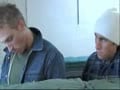 men in a cell