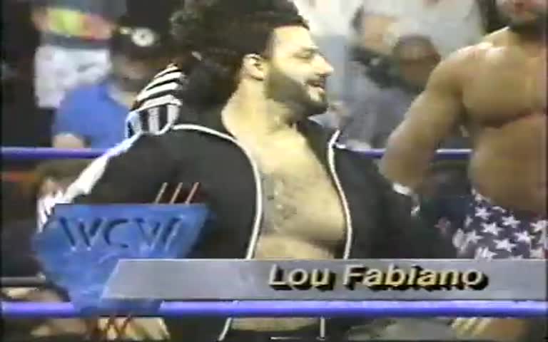 Bill Kazmaier bearhugs Lou Fabiano