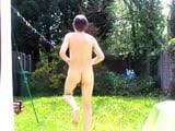 chris ellis excercises naked outside