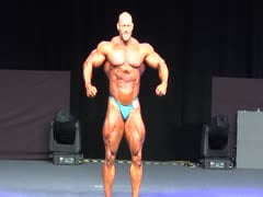 bodybuilder posing on stage