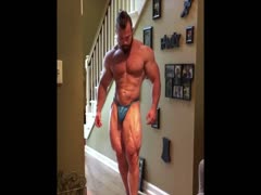 bodybuilder with weird hair posing