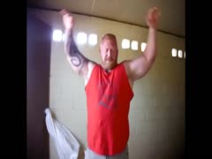 muscle bear flexing