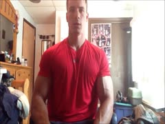 young muscle hunk flexing