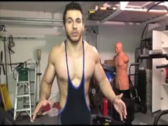 Michael jerks off in singlet