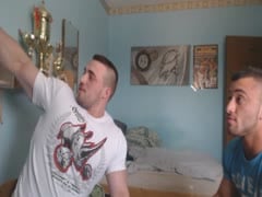 bodybuilders posing on webcam together