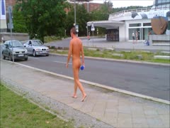 Nudist guy walking naked in the street