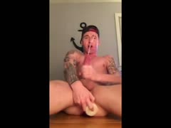 Handsome hunk plays with toys