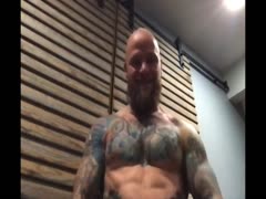 bearded tattooed hunk stroking on cam