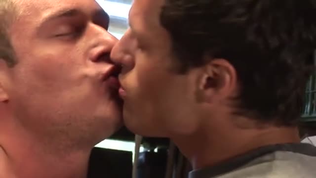 Two muscle heads enjoy themselves in the shed