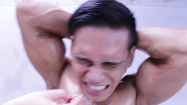 Asian guy gets nipple abused
