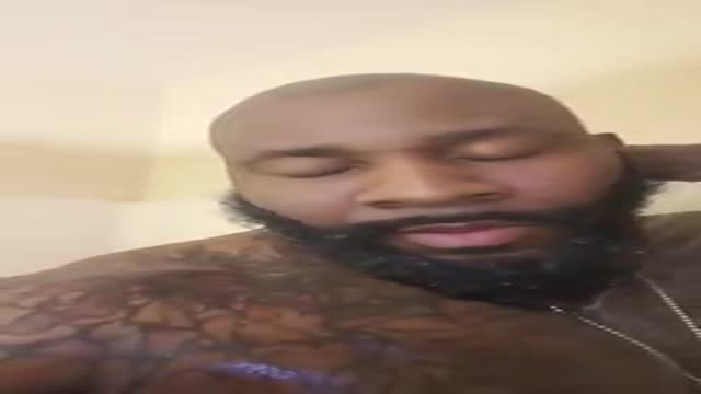 Black bearded muscle in shower