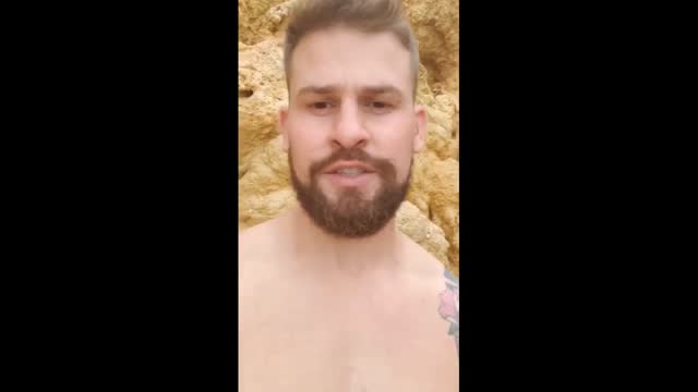 Muscular Guy Cums On The Beach