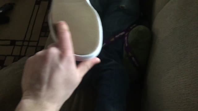 Taking off his shoes
