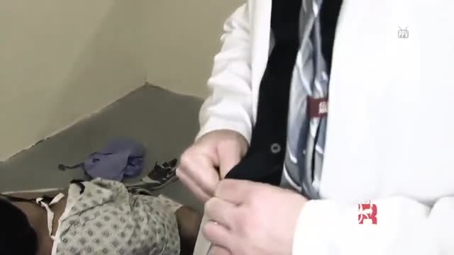 Doctor with two patients and orderly at insane