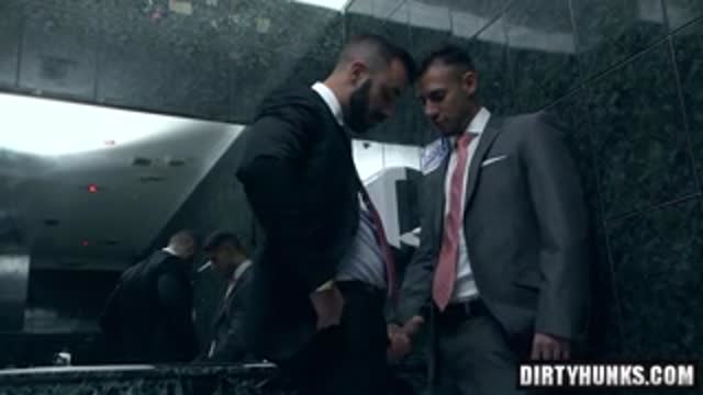 suited men, hunk Xavi fucks twink Sergyo in public toilet at urinal