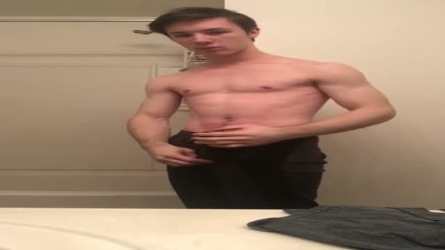 Boy showing off in shower