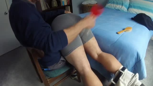 Father spanks his son