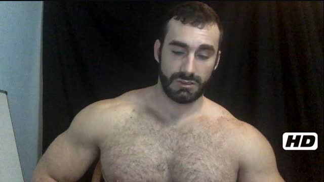 Muscle Bear Jaxton Flexs His Treetrunk Legs