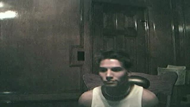 Hunk flexes in...and out of his shirt