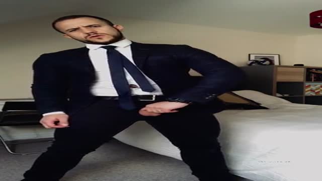 hot suited guy strips jerks and cums