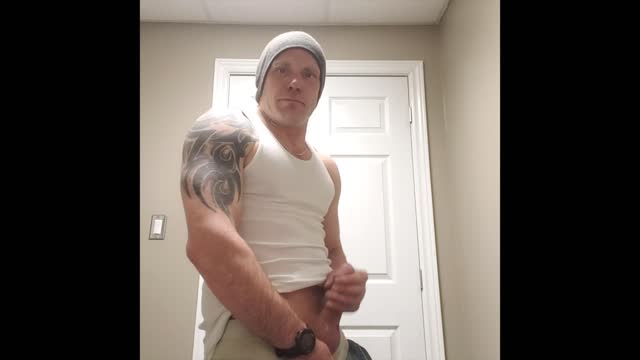 tatted guy jerks off