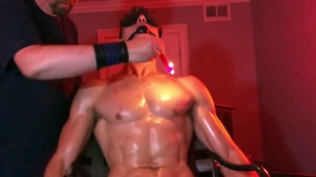 Hot wax on bounded naked man