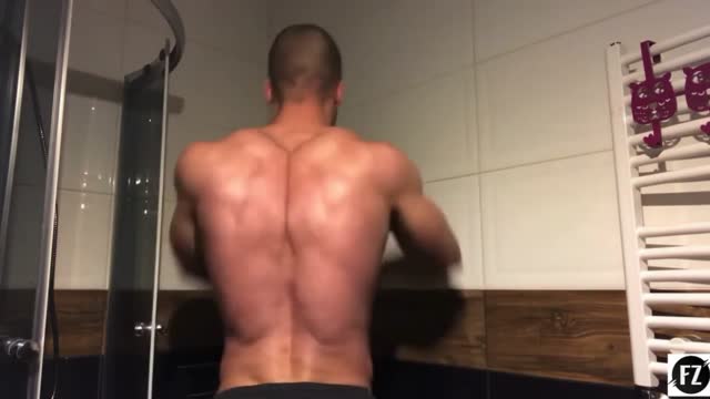 muscle hunk flexing