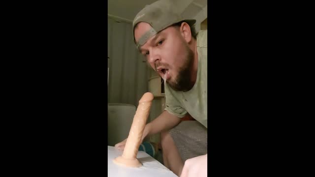 cub gagging on a dildo