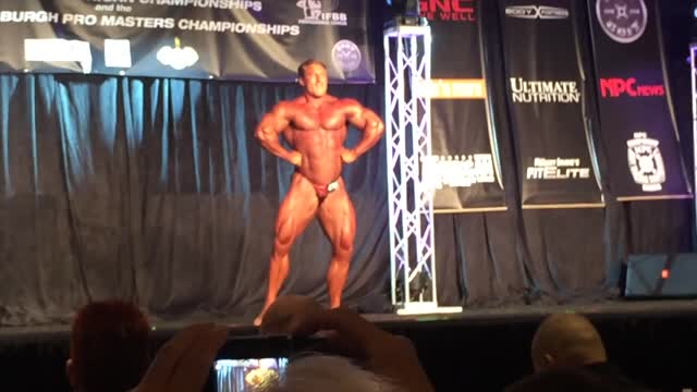 Dorian posing and flexing