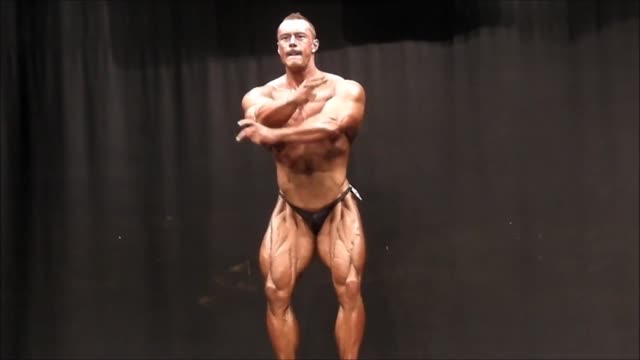 Steve posing and flexing