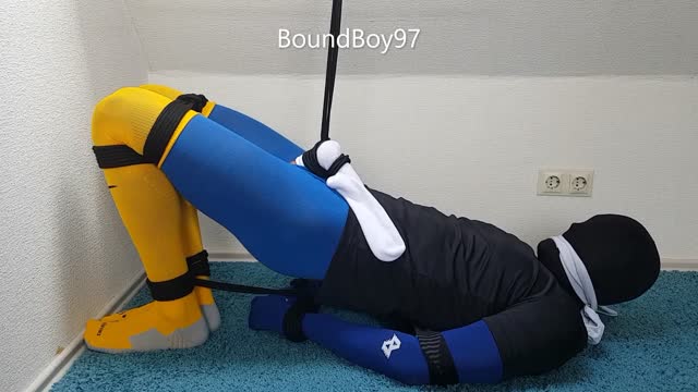Soccer Player tied up in Predicament Bondage
