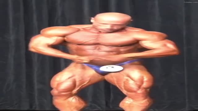 BALD MUSCLEDAD IN SHINY BLUE POSERS BALD MUSCLEDAD IN SHINY BLUE POSERS