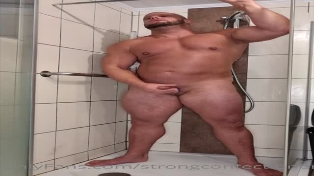 Bull guy jerks off in the shower