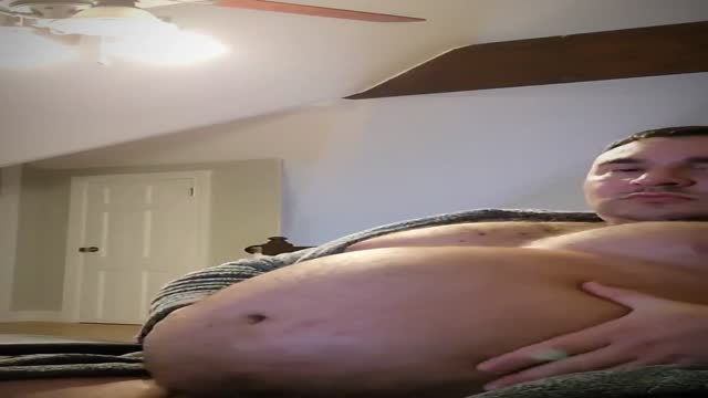 Gainer feeds and cums