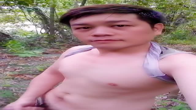 asian jerking off in forest