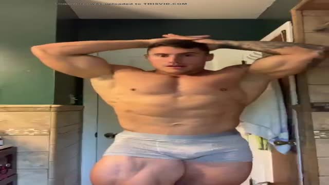 Hot muscle guy posing