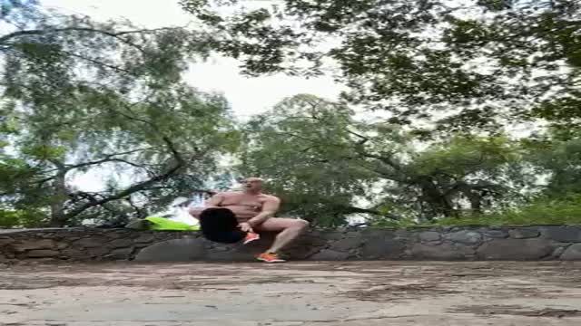 Strip to full nudity in public park